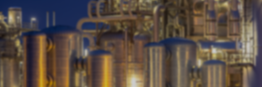Alloy selection for service in nitric acid